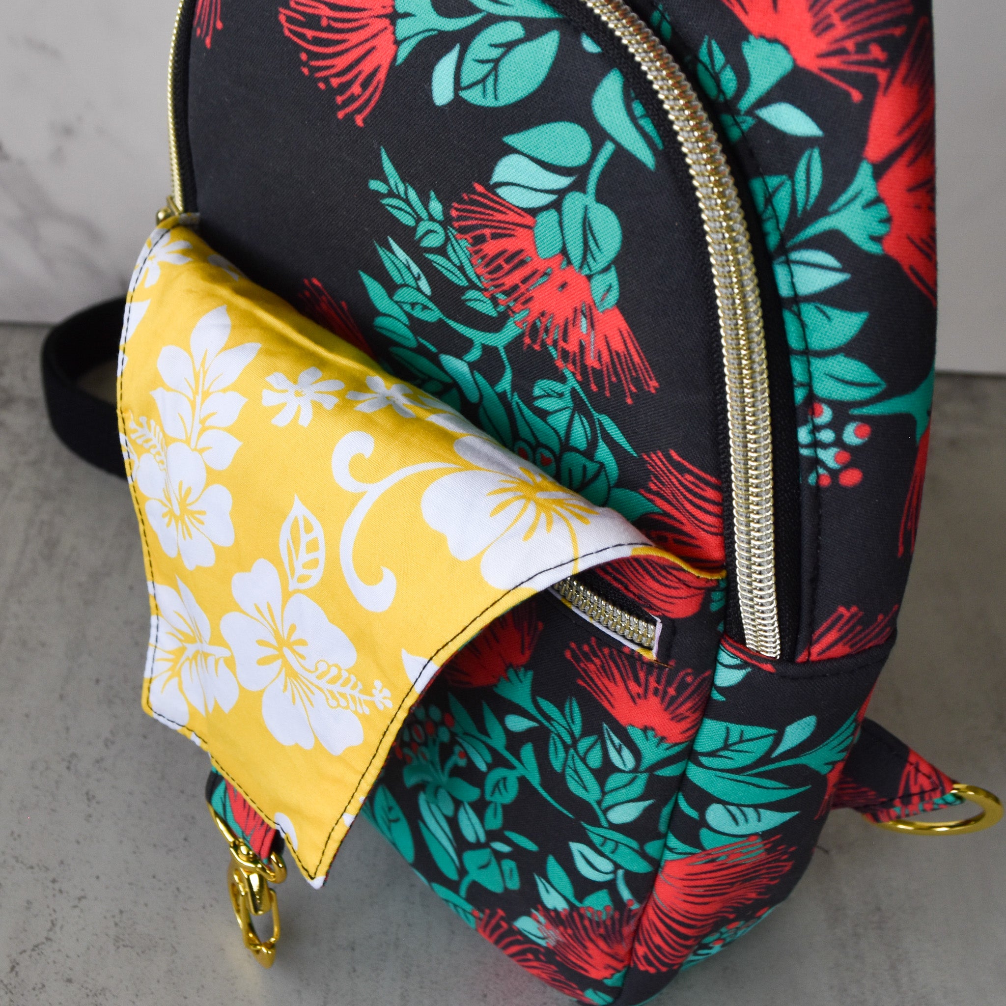 Lehua After Dark Sling Backpack