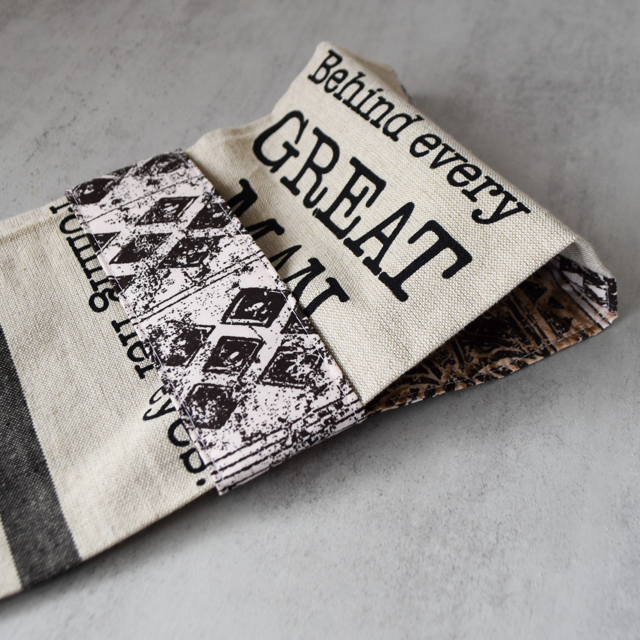 Behind Every Great Man Kitchen Towel