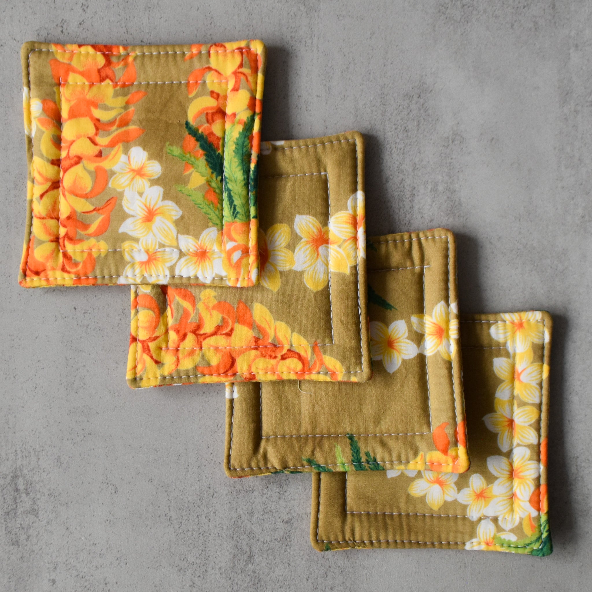 Golden Lei Fabric Coasters