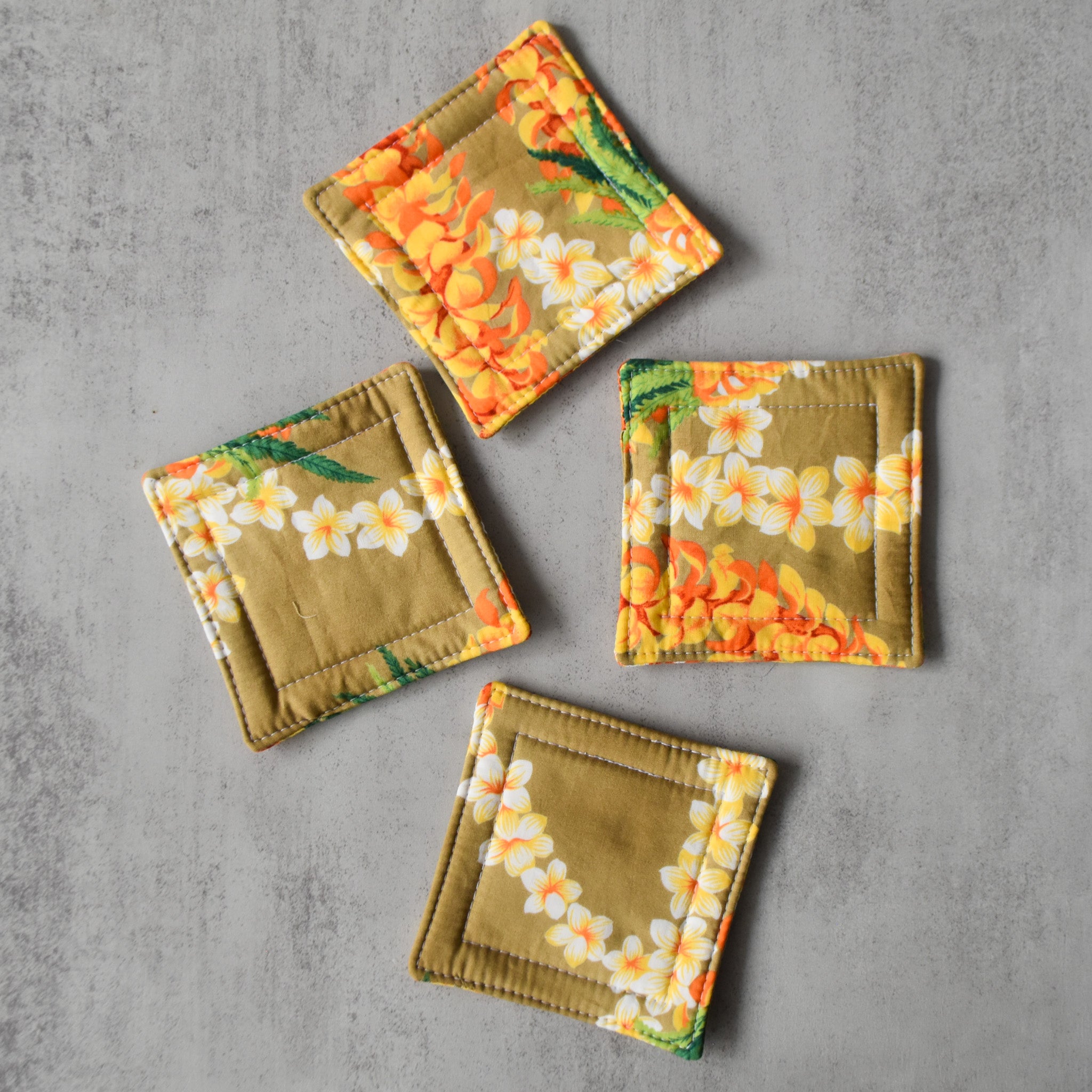Golden Lei Fabric Coasters